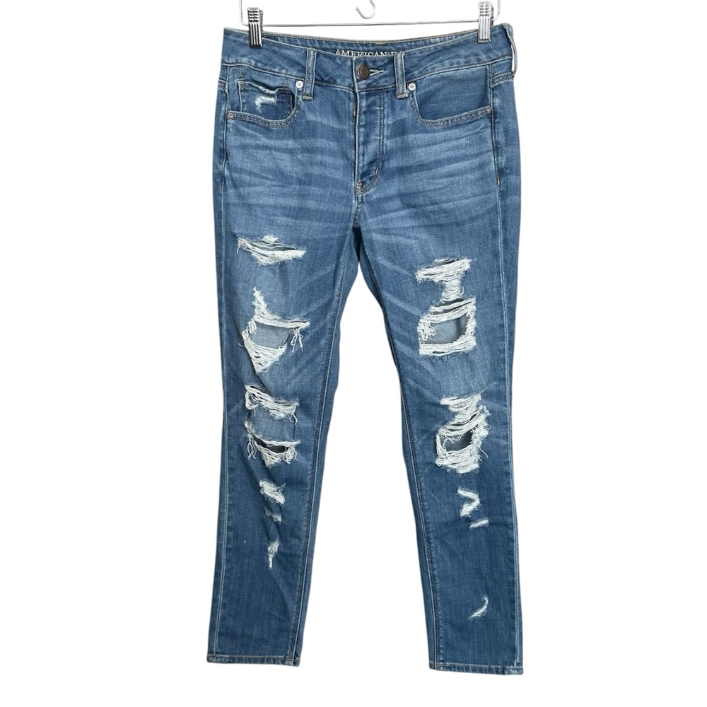 American Eagle Tomgirl jeans heavily distressed button fly